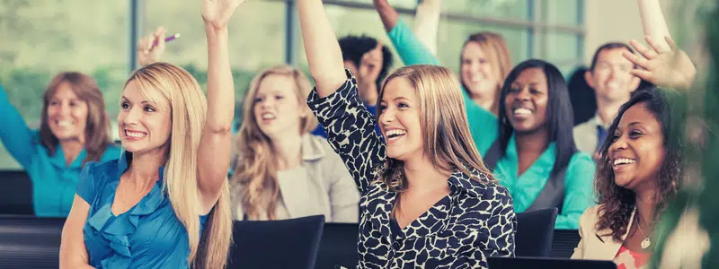 Excited Fundraisers raising their hands