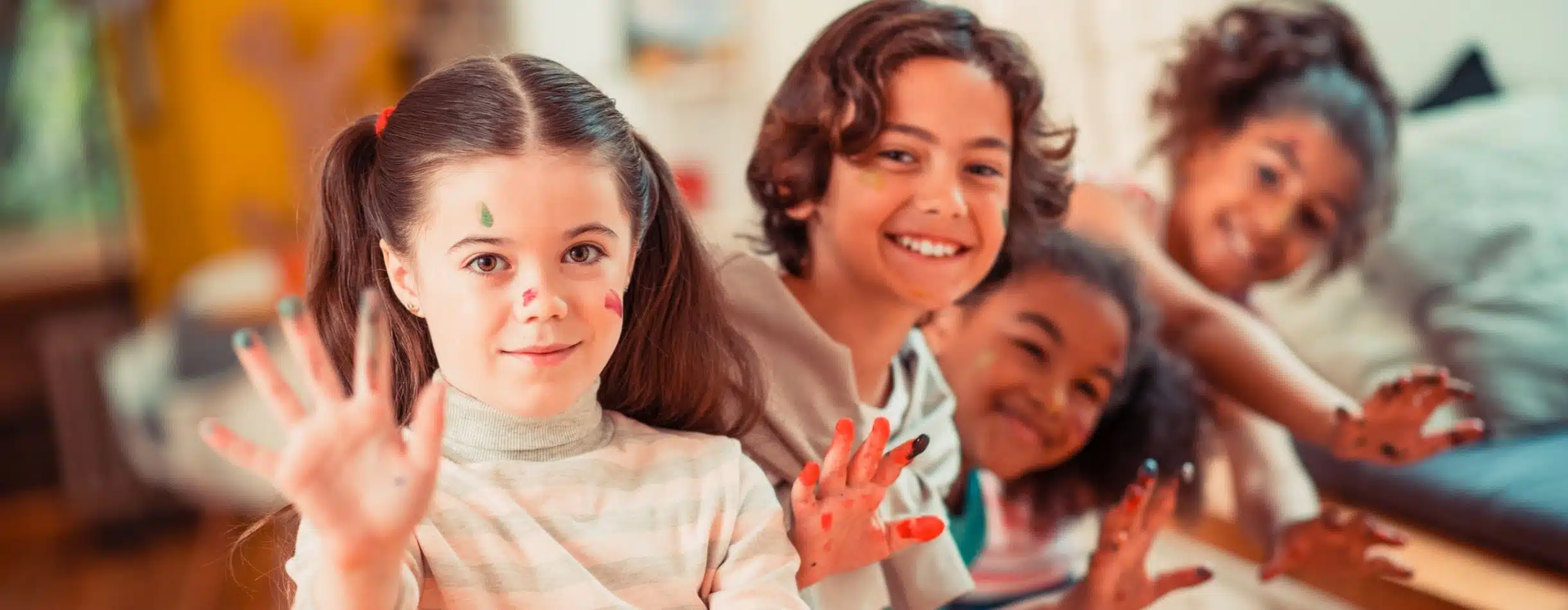 Kids painting at a Boy and Girls Club