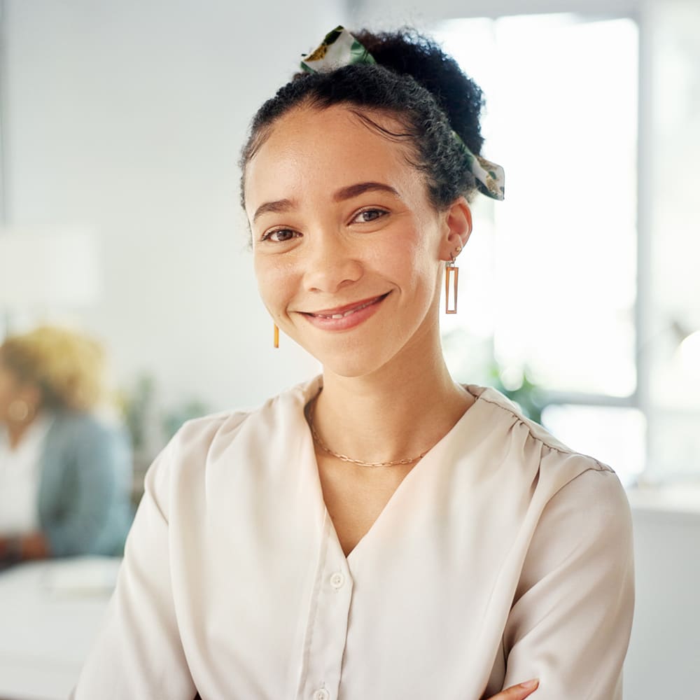 Arms Crossed, Pride And Portrait Of A Business Woman With Confidence, Happiness And Smile In Office. Expert, Success And Employee With Trust, Smiling And Happy About Job At A Corporate Company