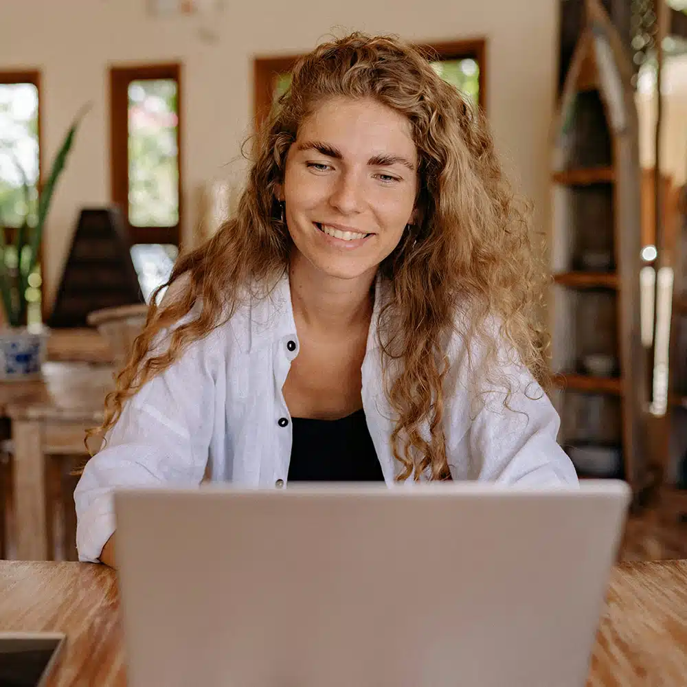 Woman learning online at computer
