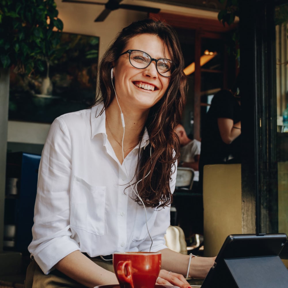 Woman smiling at cafe