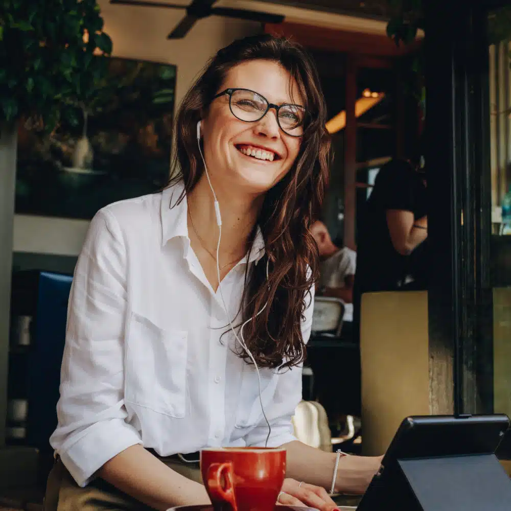 Woman smiling at cafe