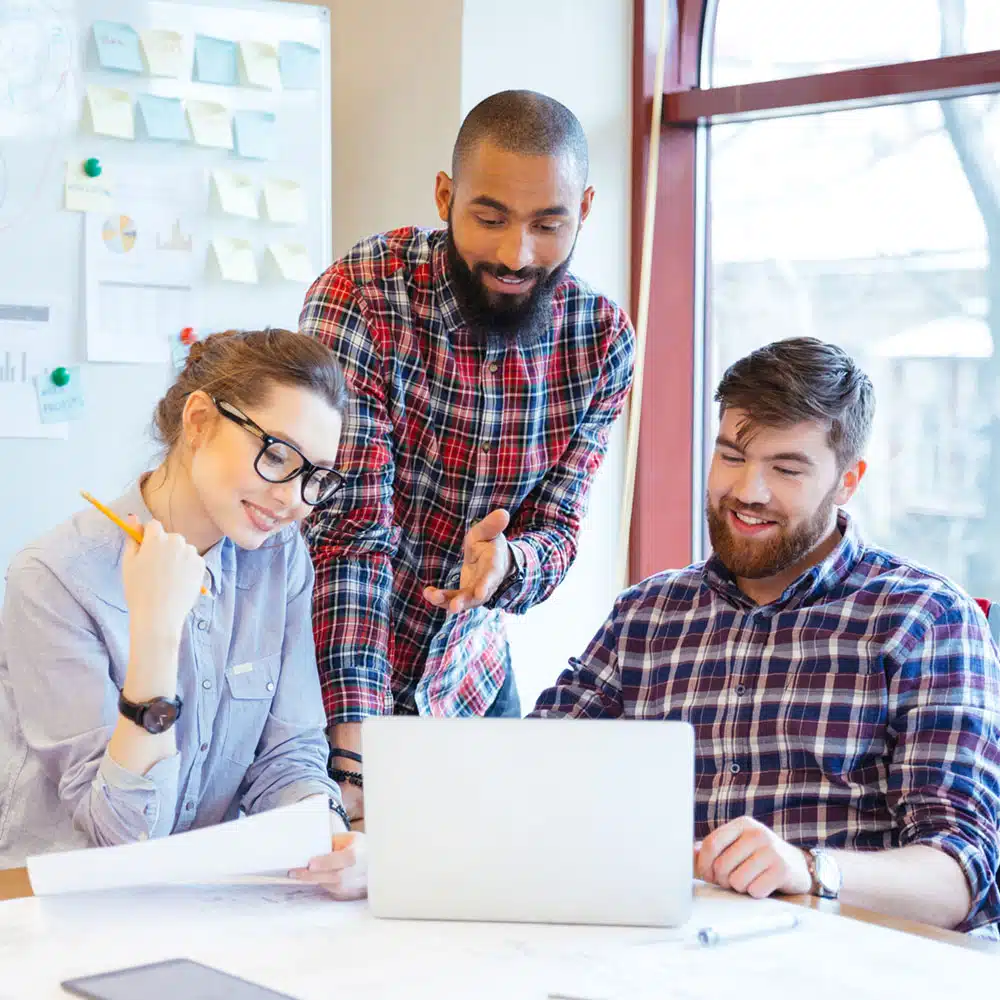Happy Business People Working With Laptop Computer