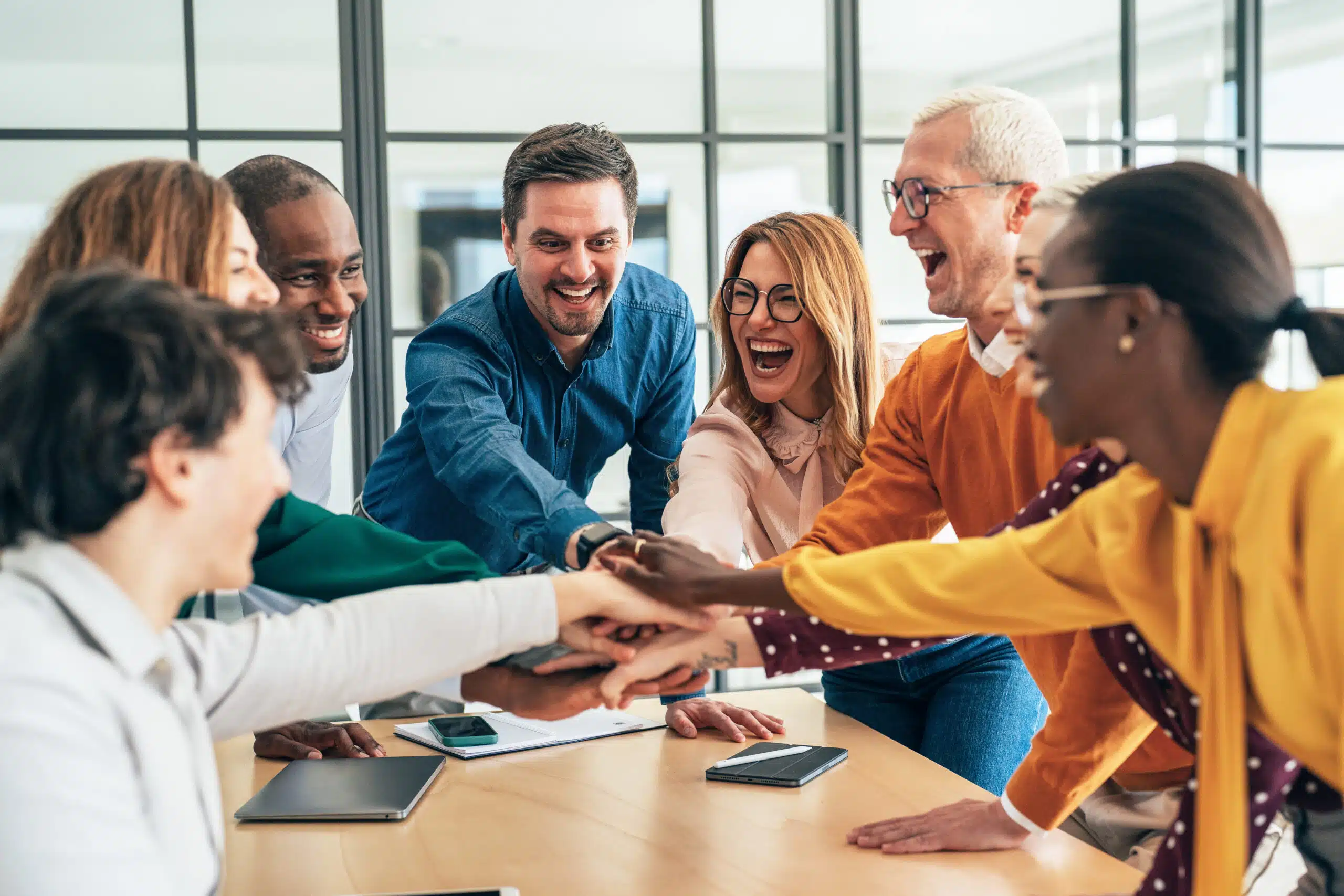 Successful Business Team celebrating a crm change with bloomerang